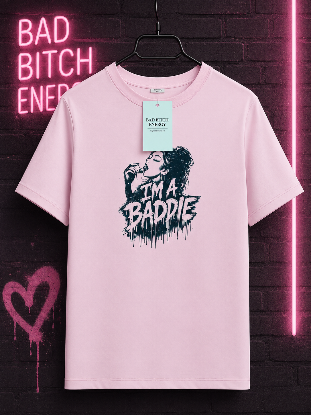 Confident woman wearing I'M A BADDIE oversized tee
